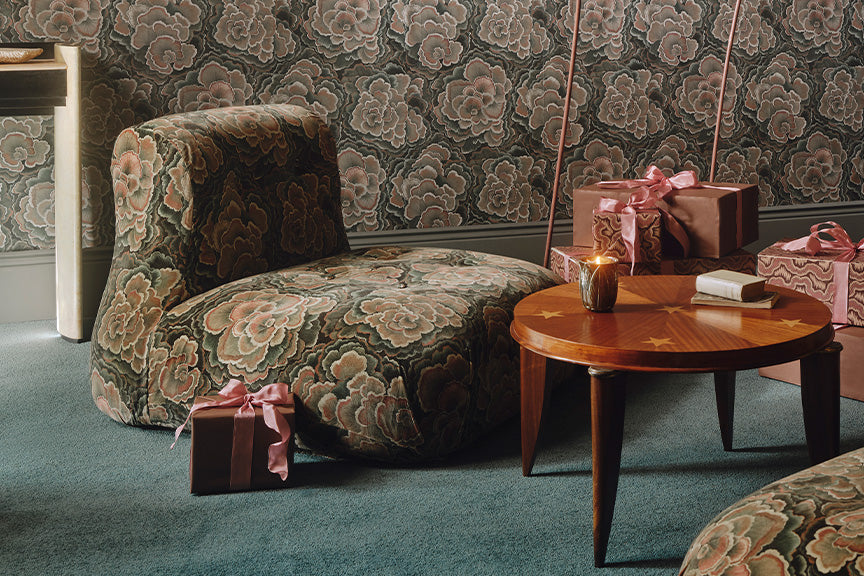 a chair with presents on it
