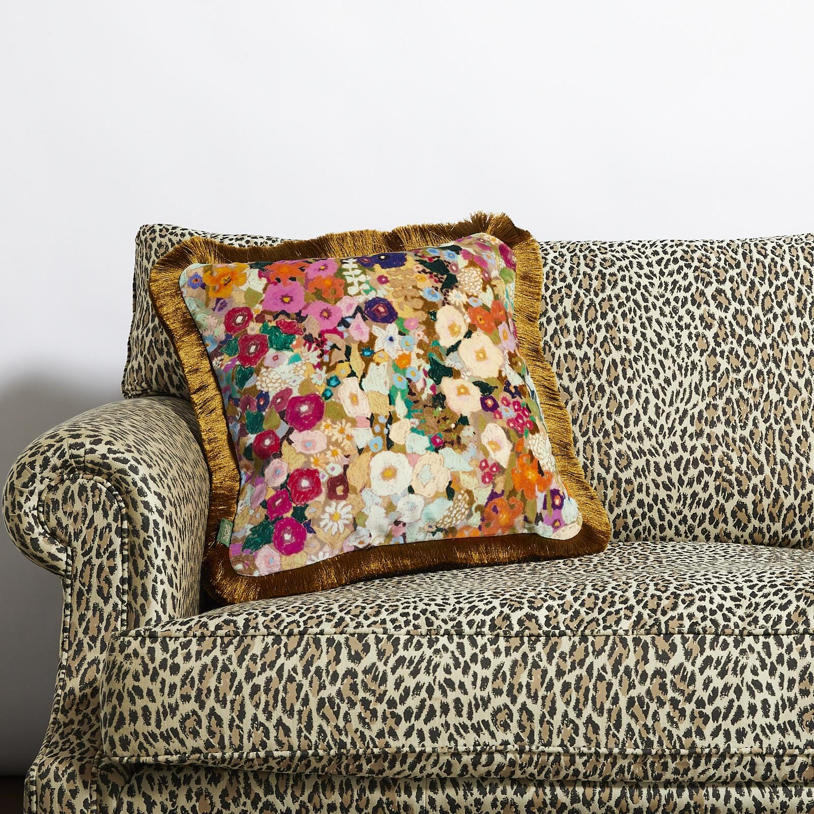 HOLLYHOCKS Medium Fringed Velvet Cushion - Spring