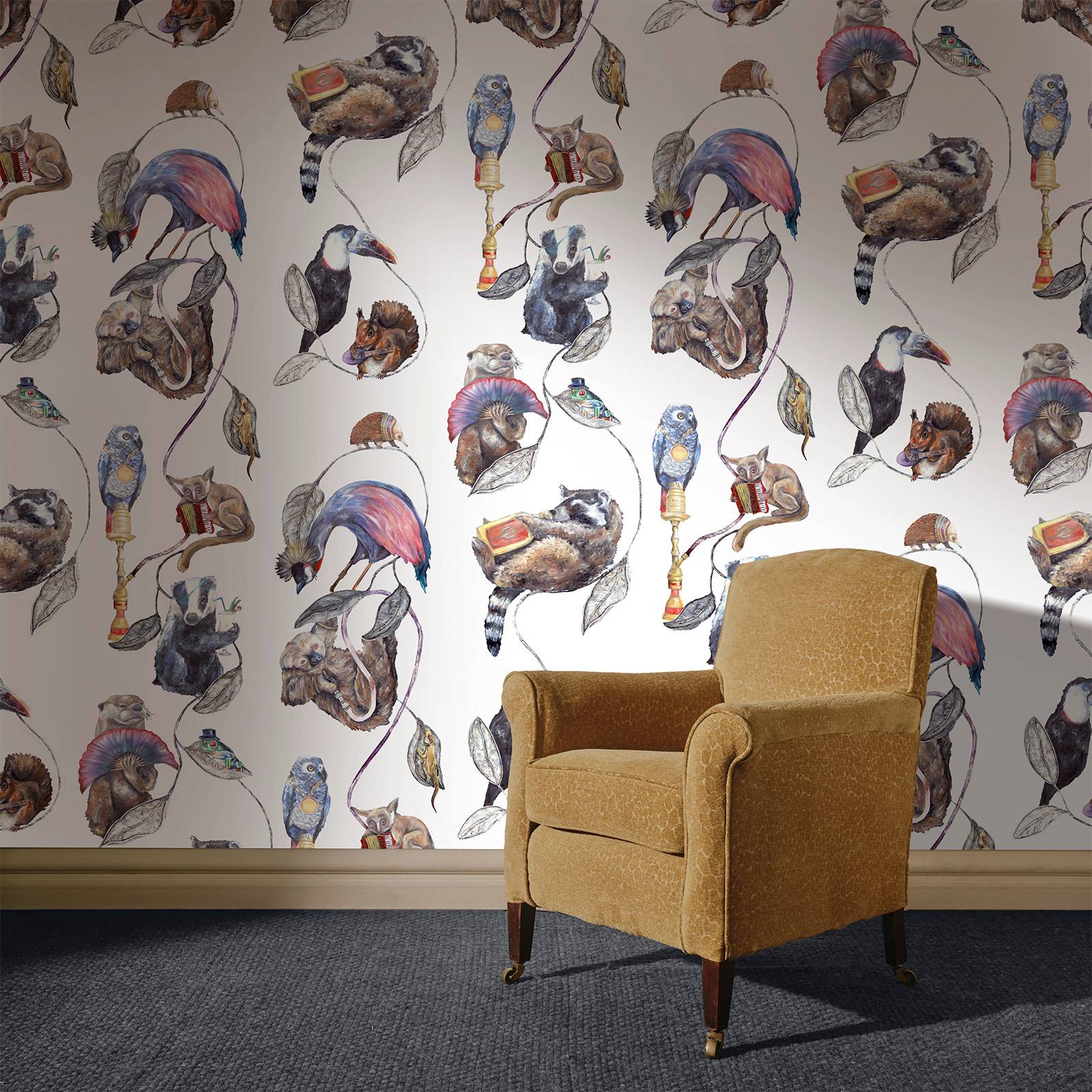 a chair in front of a wall with a pattern of animals