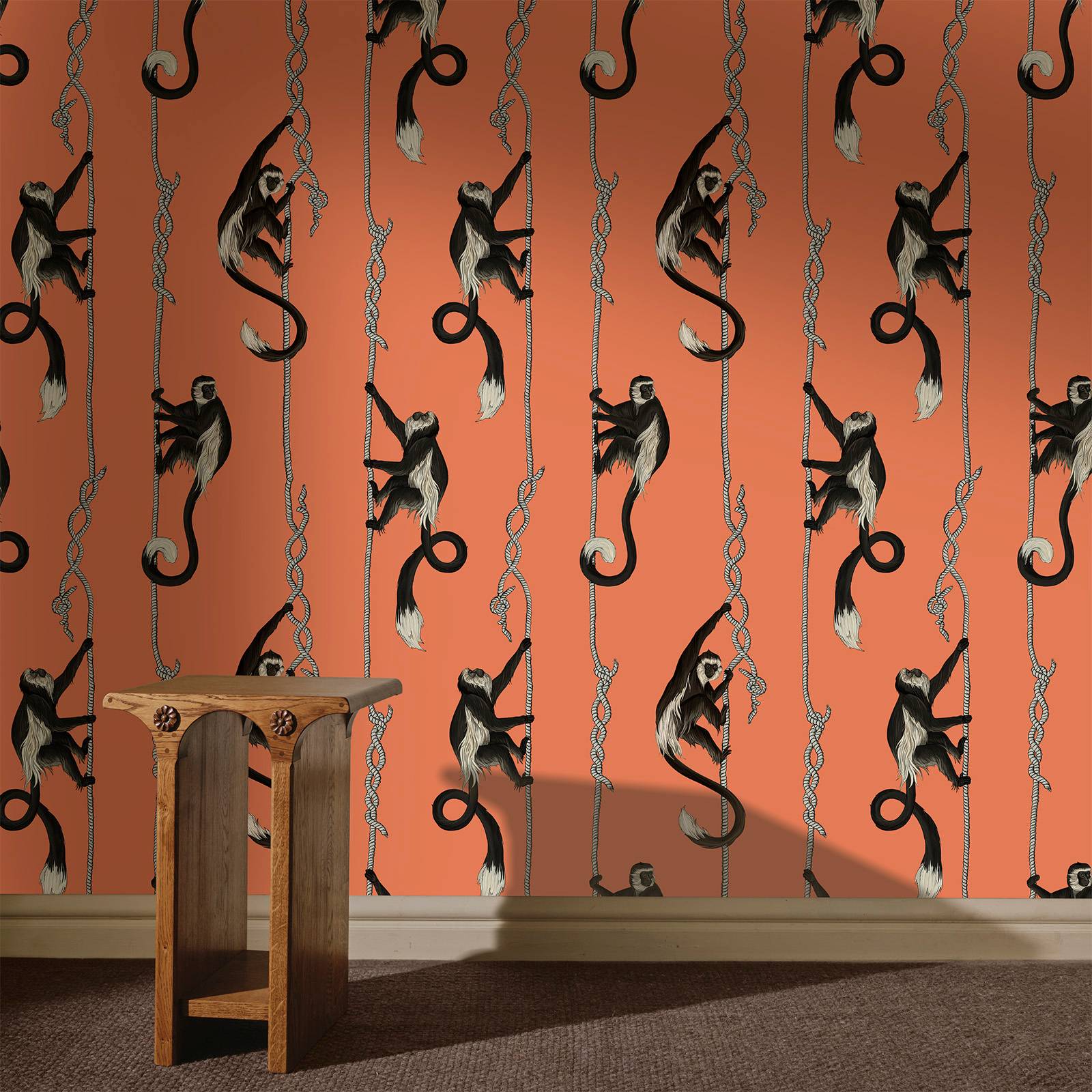 a table in front of a wall with monkeys on it