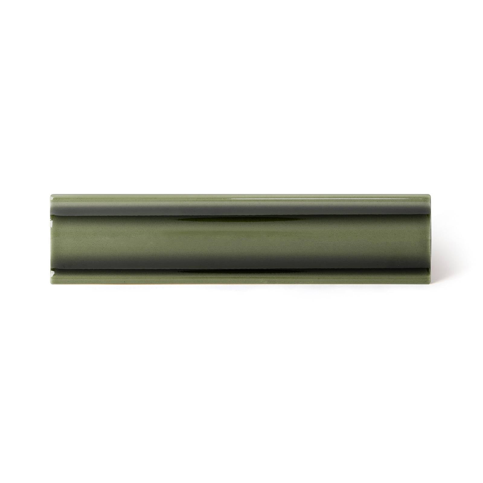 a close up of a piece of green plastic