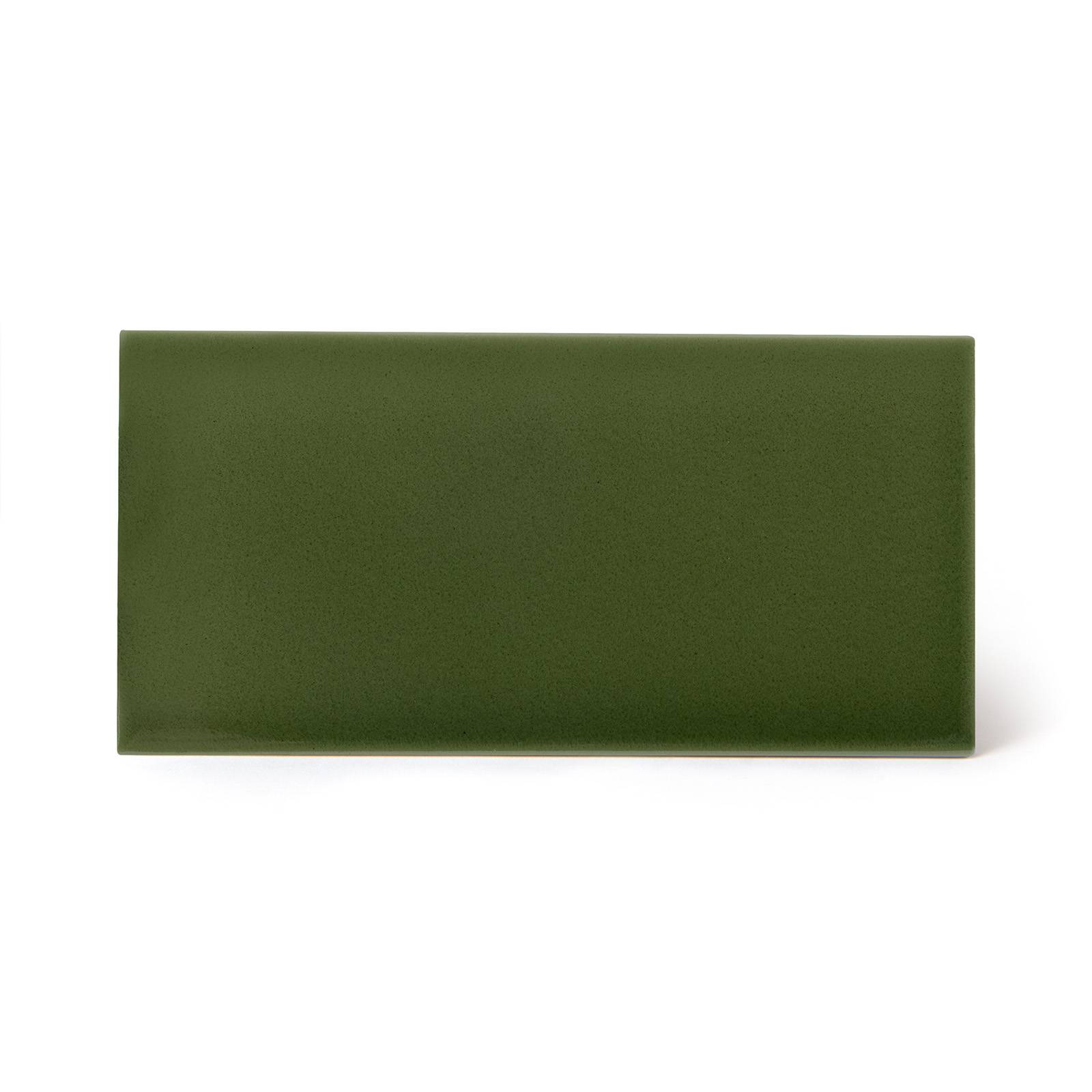 a green rectangular object on a white background